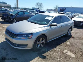 2014 Volkswagen Passat SE w/Sunroof with VIN 1VWBT7A38EC053078, listed as a IAAI auction lot 41832602 with 173,802 mi miles. Bid and sale history available at carsss.com. Image 2.