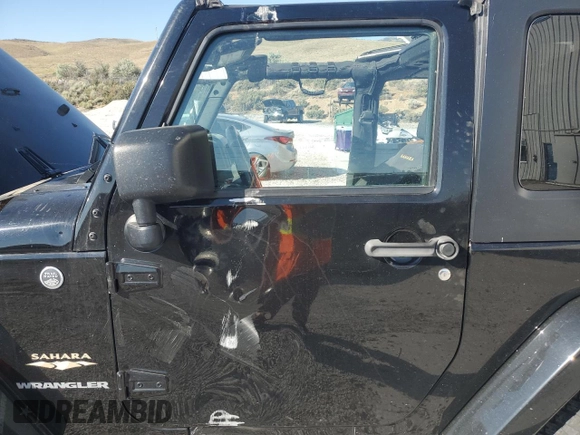 2015 Jeep Wrangler Sahara with VIN 1C4AJWBG5FL733795, listed as a Copart auction lot 61998255 with 86,655 mi miles and Salvage title. Bid and sale history available at DreamBid. Image 7.