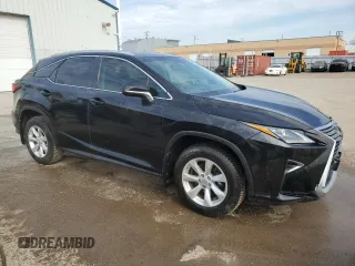 2016 Lexus RX 350 z VIN 2T2BZMCA2GC014231, wystawiony jako Copart lot #55941415 z przebiegiem 142 604 mil mil oraz Czysty tytuł • Clean title. Historia ofert i sprzedaży dostępna na DreamBid. Obrazek 4.