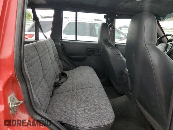 1999 Jeep Cherokee Sport with VIN 1J4FF68S1XL522902, listed as a Copart auction lot 55947745 with 212,357 mi miles and Non repairable. Bid and sale history available at DreamBid. Image 11.