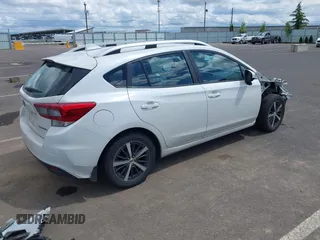 2020 Subaru Impreza Premium with VIN 4S3GTAV63L3721330, listed as a IAAI auction lot 42248125 with 115,011 mi miles and . Bid and sale history available at DreamBid. Image 4.