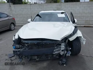 2015 Infiniti Q50 Premium with VIN JN1BV7AP1FM348389, listed as a IAAI auction lot 41754694 with 60,618 mi miles and . Bid and sale history available at DreamBid. Image 12.