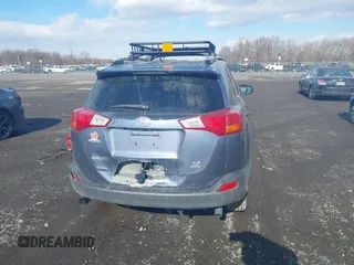 2014 Toyota RAV4 LE with VIN JTMBFREV1ED058764, listed as a IAAI auction lot 41420037 with 138,347 mi miles and . Bid and sale history available at DreamBid. Image 16.