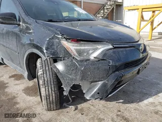2016 Toyota RAV4 XLE with VIN 2T3WFREV7GW255784, listed as a IAAI auction lot 41266085 with 87,426 mi miles. Bid and sale history available at carsss.com. Image 6.