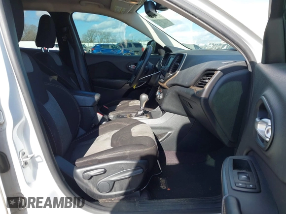 2016 Jeep Cherokee Sport with VIN 1C4PJLAS5GW207990, listed as a IAAI auction lot 41230521 with 253,524 mi miles and . Bid and sale history available at DreamBid. Image 5.