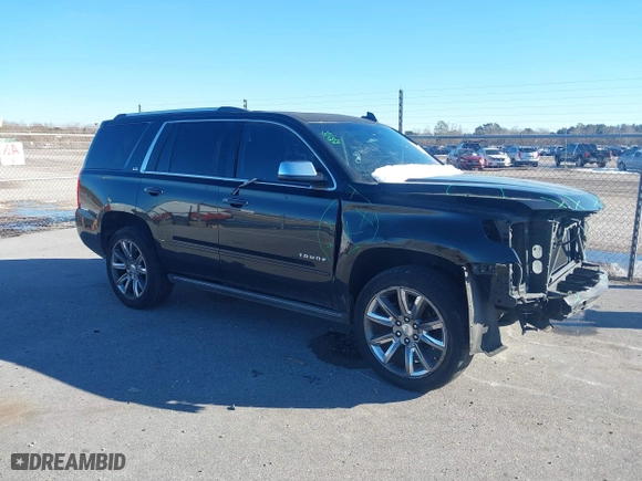 2015 Chevrolet Tahoe LTZ with VIN 1GNSCCKC8FR581994, listed as a IAAI auction lot 41406219 with 187,802 mi miles. Bid and sale history available at carsss.com. Image 13.