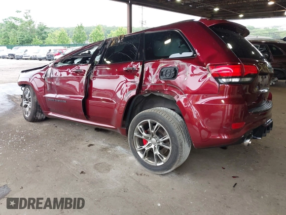 2018 Jeep Grand Cherokee SRT z VIN 1C4RJFDJ0JC231510, wystawiony jako IAAI lot #42445896 z przebiegiem 85 000 mil mil oraz . Historia ofert i sprzedaży dostępna na DreamBid. Obrazek 3.