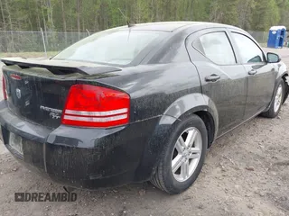 2010 Dodge Avenger R/T with VIN 1B3CC5FB1AN200983, listed as a IAAI auction lot 41959344 with 121,934 mi miles and . Bid and sale history available at DreamBid. Image 4.