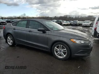 2018 Ford Fusion SE with VIN 3FA6P0H74JR170974, listed as a Copart auction lot 47134295 with 148,023 mi miles and Salvage Title. Bid and sale history available at DreamBid. Image 4.