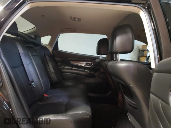 2018 Infiniti Q70 Luxe с VIN JN1BY1PR1JM370429, выставлен на аукционе Copart как лот 61178185 с пробегом 48 972 миль миль и Списание • Salvage title. История ставок и продаж доступна на DreamBid. Изображение 10.