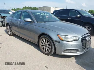 2014 Audi A6 Premium Plus z VIN WAUDFAFC2EN068735, wystawiony jako IAAI lot #42481179 z przebiegiem 226 193 mil mil oraz . Historia ofert i sprzedaży dostępna na DreamBid. Obrazek 1.