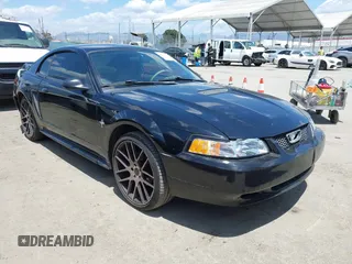 2000 Ford Mustang z VIN 1FAFP404XYF240834, wystawiony jako IAAI lot #42248264 z przebiegiem 228 809 mil mil oraz . Historia ofert i sprzedaży dostępna na DreamBid. Obrazek 1.