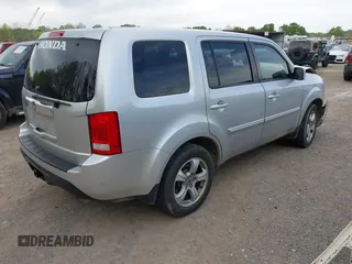 2012 Honda Pilot EX-L with VIN 5FNYF3H5XCB004016, listed as a IAAI auction lot 42059035 with 201,888 mi miles and . Bid and sale history available at carsss.com. Image 4.