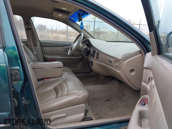1998 Buick Century Limited with VIN 2G4WY52MXW1573044, listed as a IAAI auction lot 41967391 with 142,169 mi miles. Bid and sale history available at carsss.com. Image 5.