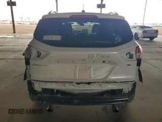 2015 Ford Escape SE with VIN 1FMCU9GX2FUB49175, listed as a Copart auction lot 54582125 with 90,544 mi miles and Salvage Title. Bid and sale history available at DreamBid. Image 6.