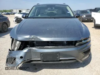 2018 Volkswagen Tiguan SEL with VIN 3VV3B7AX3JM010677, listed as a Copart auction lot 50615395 with 7,559 mi miles and Salvage Title. Bid and sale history available at DreamBid. Image 5.