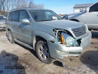 2003 Lexus GX 470 with VIN JTJBT20XX30015034, listed as a IAAI auction lot 41386690 with 234,983 mi miles. Bid and sale history available at carsss.com. Image 1.