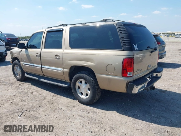 2005 GMC Yukon XL SLT with VIN 1GKEC16Z25J229939, listed as a IAAI auction lot 42064340 with 211,964 mi miles. Bid and sale history available at carsss.com. Image 3.