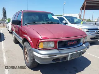 1995 GMC Jimmy SLE z VIN 1GKDT13W3S2548228, wystawiony jako IAAI lot #42217140 z przebiegiem 208 846 mil mil oraz . Historia ofert i sprzedaży dostępna na DreamBid. Obrazek 1.