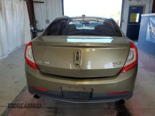 2013 Lincoln MKS EcoBoost with VIN 1LNHL9FT2DG604657, listed as a Copart auction lot 65357735 with 133,548 mi miles and Salvage title. Bid and sale history available at DreamBid. Image 6.