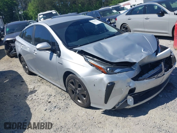 2020 Toyota Prius L Eco z VIN JTDKARFUXL3125434, wystawiony jako IAAI lot #42201623 z przebiegiem 58 609 mil mil oraz . Historia ofert i sprzedaży dostępna na DreamBid. Obrazek 1.