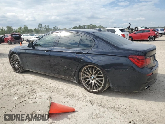 2015 BMW 7 Series 750i with VIN WBAYA8C59FG197642, listed as a Copart auction lot 70282884 with 130,853 mi miles and Salvage title. Bid and sale history available at DreamBid. Image 2.