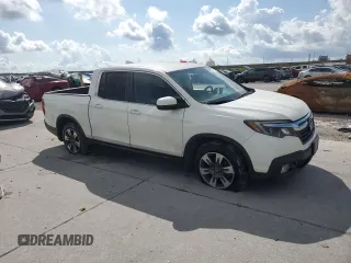2017 Honda Ridgeline RTL with VIN 5FPYK2F53HB001434, listed as a Copart auction lot 58414335 with 187,711 mi miles and Salvage title. Bid and sale history available at DreamBid. Image 4.