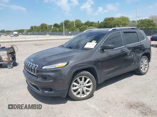 2014 Jeep Cherokee Limited with VIN 1C4PJLDBXEW183095, listed as a IAAI auction lot 41814496 with 89,589 mi miles and . Bid and sale history available at DreamBid. Image 17.