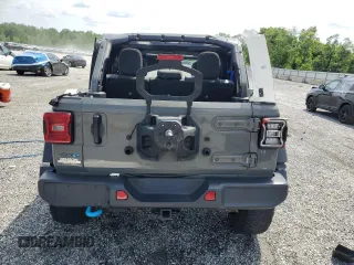 2022 Jeep Wrangler Unlimited Rubicon with VIN 1C4JJXR69NW206276, listed as a Copart auction lot 55247595 with 39,273 mi miles and Salvage title. Bid and sale history available at DreamBid. Image 6.