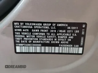 2012 Volkswagen Passat SE z VIN 1VWBP7A36CC002082, wystawiony jako Copart lot #60692375 z przebiegiem 154 980 mil mil oraz Szkoda całkowita • Salvage title. Historia ofert i sprzedaży dostępna na DreamBid. Obrazek 13.