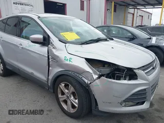 2015 Ford Escape SE with VIN 1FMCU0G95FUC81490, listed as a IAAI auction lot 42136791 with 140,967 mi miles. Bid and sale history available at carsss.com. Image 6.