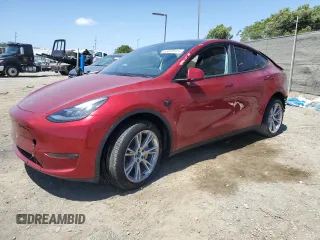 2024 Tesla Model Y Long Range with VIN 7SAYGDEE8RA233147, listed as a Copart auction lot 56695545 with 9,512 mi miles and Salvage title. Bid and sale history available at DreamBid. Image 1.