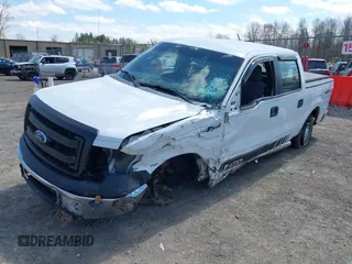2014 Ford F-150 XL with VIN 1FTFW1EF0EKG24050, listed as a IAAI auction lot 42074584 with 129,448 mi miles and . Bid and sale history available at DreamBid. Image 2.