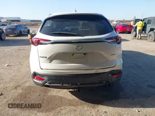 2016 Mazda CX-9 Grand Touring z VIN JM3TCADY6G0125547, wystawiony jako IAAI lot #41997445 z przebiegiem 129 179 mil mil oraz . Historia ofert i sprzedaży dostępna na DreamBid. Obrazek 16.