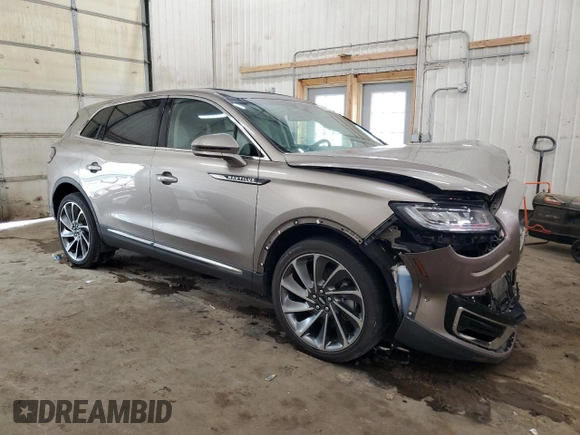 2020 Lincoln Nautilus Reserve z VIN 2LMPJ8K93LBL02777, wystawiony jako Copart lot #59559575 z przebiegiem Nie podano mil oraz Szkoda całkowita • Salvage title. Historia ofert i sprzedaży dostępna na DreamBid. Obrazek 4.