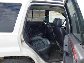 2001 Jeep Grand Cherokee Limited with VIN 1J4GW58N21C560302, listed as a IAAI auction lot 41072475 with 172,529 mi miles. Bid and sale history available at carsss.com. Image 8.