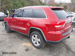 2011 Jeep Grand Cherokee Laredo with VIN 1J4RR4GT8BC636651, listed as a IAAI auction lot 41768944 with 200,160 mi miles. Bid and sale history available at carsss.com. Image 3.