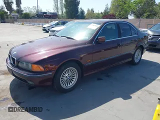 1998 BMW 5 Series 540iA with VIN WBADE6325WBW59821, listed as a IAAI auction lot 42063032 with 199,693 mi miles. Bid and sale history available at carsss.com. Image 2.