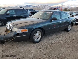 1998 Ford Crown Victoria LX with VIN 2FAFP74W9WX171309, listed as a Copart auction lot 80585734 with 192,162 mi miles and Salvage Title. Bid and sale history available at carsss.com. Image 1.