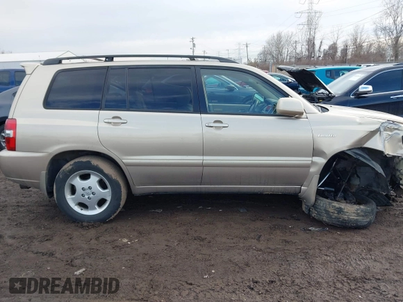 2004 Toyota Highlander z VIN JTEEP21AX40055853, wystawiony jako IAAI lot #41640471 z przebiegiem 186 409 mil mil oraz . Historia ofert i sprzedaży dostępna na DreamBid. Obrazek 13.