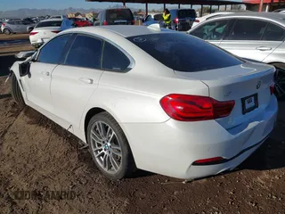 2018 BMW 4 Series 430i with VIN WBA4J1C5XJBG77414, listed as a IAAI auction lot 41685952 with Not Provided miles and . Bid and sale history available at DreamBid. Image 3.