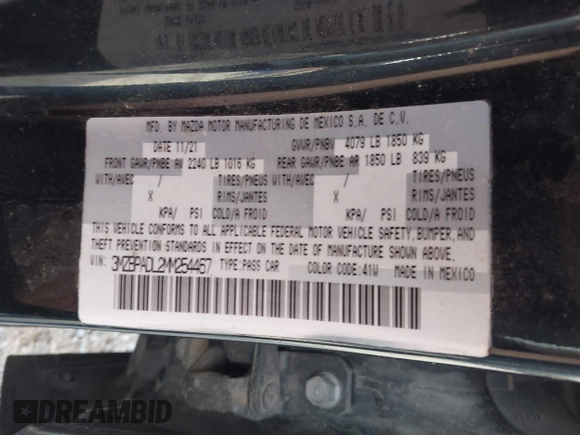 2021 Mazda 3 Premium z VIN 3MZBPADL2MM254467, wystawiony jako IAAI lot #42151557 z przebiegiem 63 282 mil mil oraz . Historia ofert i sprzedaży dostępna na DreamBid. Obrazek 9.