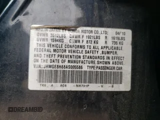 2010 Honda Fit Sport with VIN JHMGE8H68AS005586, listed as a Copart auction lot 57582755 with 109,872 mi miles and Salvage title. Bid and sale history available at DreamBid. Image 12.