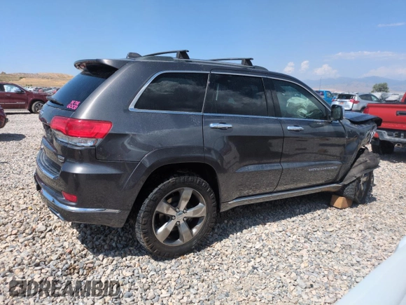 2014 Jeep Grand Cherokee Summit with VIN 1C4RJFJM8EC395169, listed as a Copart auction lot 60637265 with 116,575 mi miles and Salvage title. Bid and sale history available at DreamBid. Image 3.