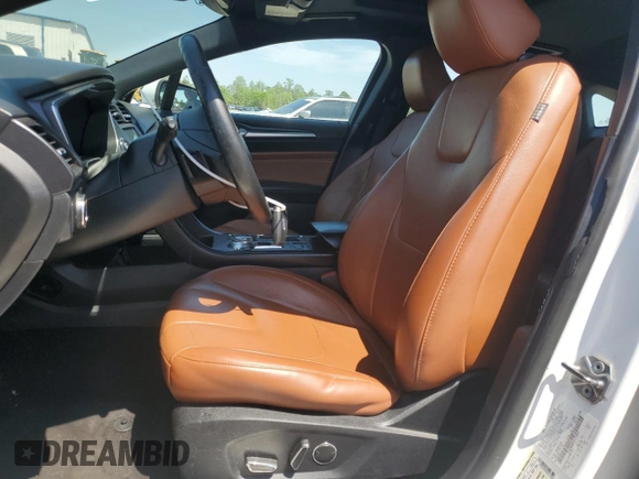 2020 Ford Fusion Titanium с VIN 3FA6P0K99LR174094, выставлен на аукционе Copart как лот 52583435 с пробегом 98 389 миль миль и Списание • Salvage title. История ставок и продаж доступна на DreamBid. Изображение 7.