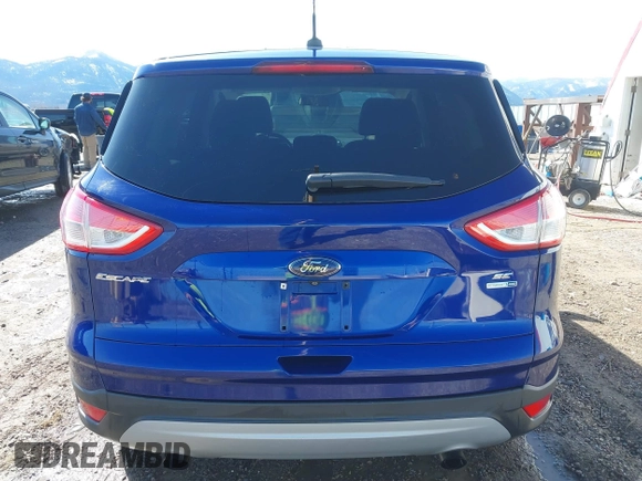 2014 Ford Escape SE with VIN 1FMCU9G99EUD02098, listed as a IAAI auction lot 41814969 with 210,218 mi miles and . Bid and sale history available at DreamBid. Image 17.