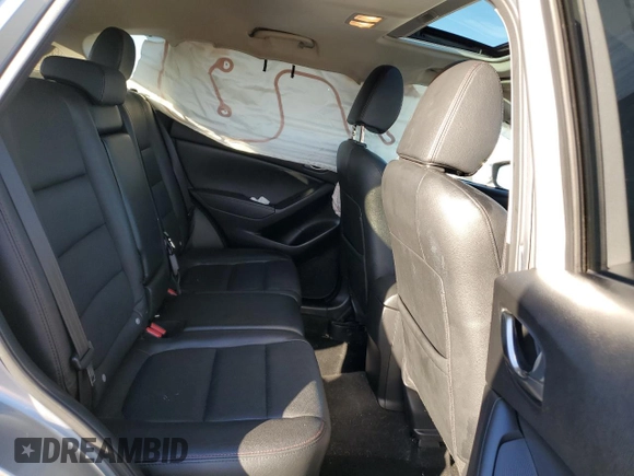2014 Mazda CX-5 Grand Touring with VIN JM3KE2DY8E0412025, listed as a Copart auction lot 42863655 with 72,416 mi miles and Salvage Title. Bid and sale history available at carsss.com. Image 10.