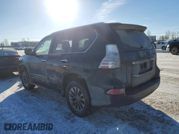 2015 Lexus GX 460 Luxury with VIN JTJJM7FX9F5100581, listed as a Copart auction lot 41555565 with 228,698 mi miles and Salvage title. Bid and sale history available at DreamBid. Image 2.