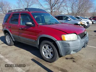 2003 Ford Escape XLT Popular 2 with VIN 1FMCU93183KC65571, listed as a IAAI auction lot 41768982 with 150,658 mi miles. Bid and sale history available at carsss.com. Image 1.
