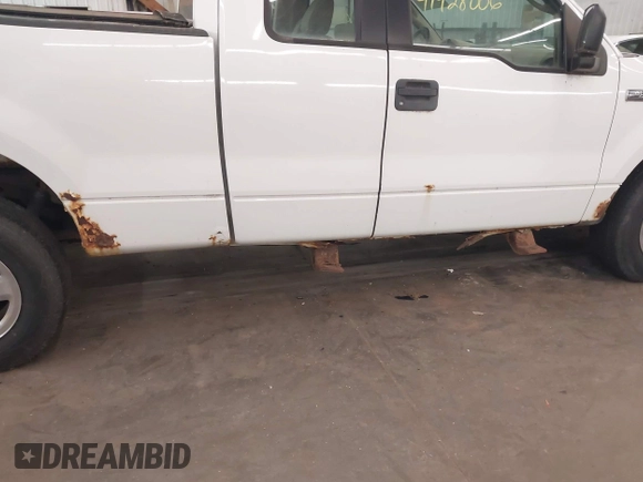 2005 Ford F-150 XLT with VIN 1FTPX14565NA51874, listed as a IAAI auction lot 41928006 with 201,004 mi miles. Bid and sale history available at carsss.com. Image 6.